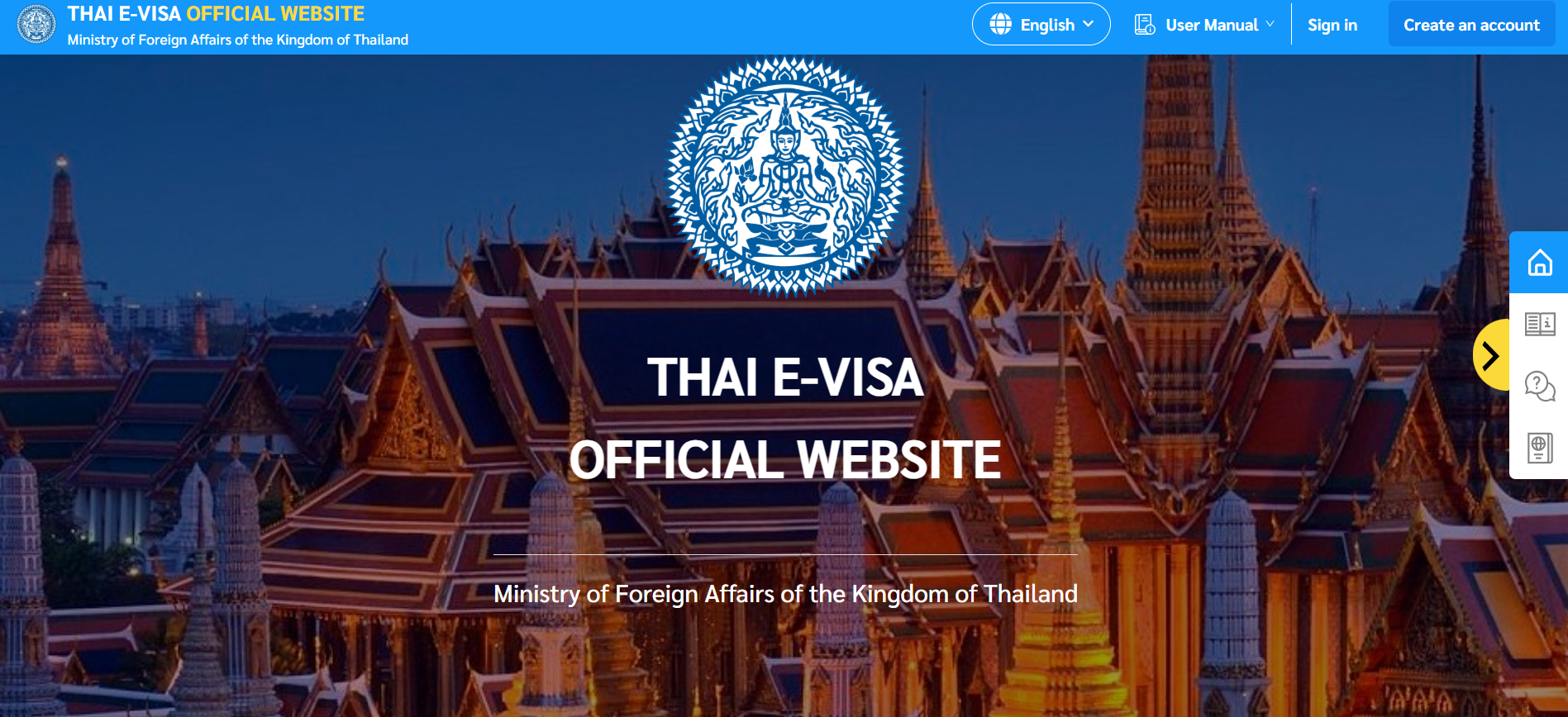 Laptop showing online visa application form with passport and documents